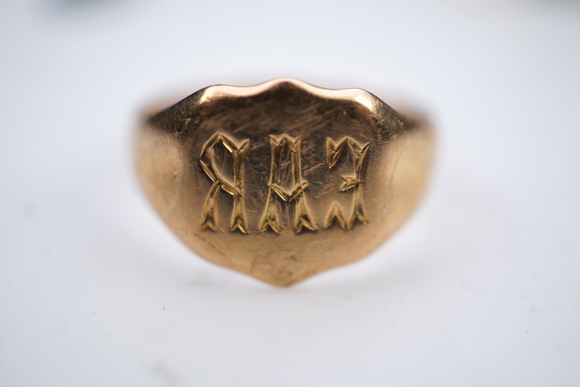 A collection of seven gold rings